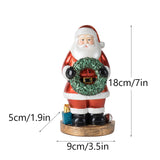 Santa Claus Figurine with Wreath - 18cm Festive Resin Christmas Decoration - Side View