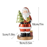 Santa Claus Figurine with Christmas Tree - 18cm Festive Resin Christmas Decoration - Side View