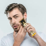3-in-1 Professional Hair Clipper Set - Rechargeable Beard Trimmer, Nose Hair Trimmer, and Electric Shaver with USB Cable, Cleaning Brush, and Attachments - Front View
