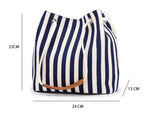 Blue Canvas Bucket Tote Bag with Leather Handle - 45-Degree Angle