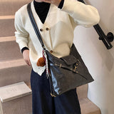 Black Elegant Faux Leather Shoulder Bag with Adjustable Strap - Side View