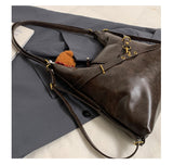Black Elegant Faux Leather Shoulder Bag with Adjustable Strap - 45-Degree Angle