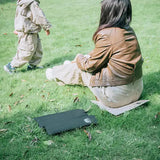 4 PCS Black Portable Waterproof Outdoor Picnic Mat, Moisture-Proof Thermal Seat Pad, Foldable and Lightweight Travel Cushion - Side View