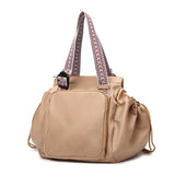Brown Convertible Multifunctional Baby Cradle Travel Bag - Women's Backpack, Shoulder Bag, Mummy Bag with Expandable Storage - Side View