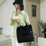 Red Minimalist Nylon Tote Bag with Adjustable Shoulder Strap, Large Capacity - Front View