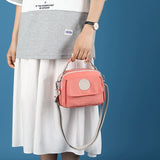 Pink Compact Nylon Crossbody Bag - Stylish and Versatile Shoulder Purse - Side View