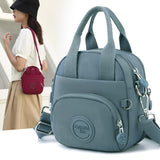 Deep Teal Mini Waterproof Nylon Backpack - Lightweight Casual Crossbody Bag - Front View
