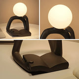 White Creative Book Reader Desk Lamp - USB Powered, Modern Resin Design - Front View