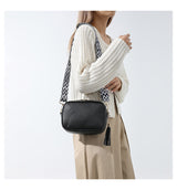 Black Trendy Crossbody Shoulder Bag with Tassel Accent - Compact and Stylish - Top-Down View