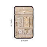 Black Travel Jewelry Organizer - Compact Roll-Up Storage Bag with Multiple Compartments - Top-Down View