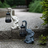 Grey Meditating Elephant Solar Lantern Statue - Decorative Garden Light for Outdoor Spaces - Front View