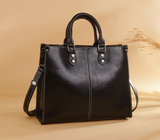 Black Elegant Leather Handbag - StylishTote with Adjustable Strap, Spacious and Durable