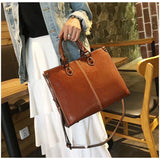 Black Elegant Leather Handbag - StylishTote with Adjustable Strap, Spacious and Durable - Side View