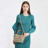 Beige Genuine Leather Women's Handbag - Stylish Bucket Bag with Top Handle and Crossbody Strap - 45-Degree Angle