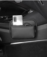 Brown PU Leather Car Storage Organizer with Dual Charging Holes and Inner Mesh Pocket, Multi-functional Door Handle Hanging Bag for Phones and Accessories, Lightweight and Durable - Front View