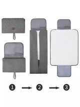 Black Portable Baby Changing Mat - Waterproof, Foldable, Compact Diaper Pad for Travel & Everyday Use - Top-Down View