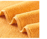 Bright Orange Premium Thick Cotton Bath Towel for Adults - Soft and Absorbent Bathroom Towel - Close-Up Angle