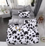 Black and White Cow Pattern 3-Piece Polyester Duvet Cover Set with 2 Pcs Pillowcases - Elegant Bedding, Machine Washable, 173x230cm Duvet + 51x76cm Pillowcases - Front View