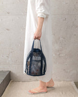 Navy Blue Lightweight Mesh Drawstring Beach Bag - Portable Travel Organizer for Toiletries and Essentials - Front View