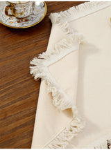4 PCS Beige Cotton Linen Placemat with Fringe - Solid Color Table Mat for Dining (30x30cm) - Top-Down View
