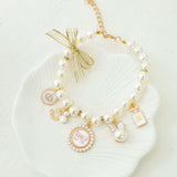 White 4-PCS Pearl Charm Pet Necklace - Adjustable Bowknot Collar for Small Dogs & Cats (L: 30+5CM) - Front View