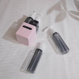 Square Pink 2-Piece 4-in-1 Travel Dispenser Set-Leakproof Refillable Bottles for Toiletries - Side View