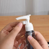 Square Pink 2-Piece 4-in-1 Travel Dispenser Set-Leakproof Refillable Bottles for Toiletries - Top-Down View