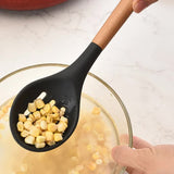 White And Brown 12-Piece Silicone Kitchen Utensil Set - Non-Stick Food-Grade Silicone Cooking Tools with Wooden Handles and Holder - Close-Up Angle