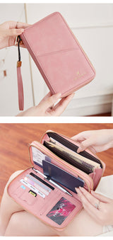 Pink RFID Blocking Passport Wallet - Multi-Function Travel Organizer with Double Zipper and Crossbody Strap - Front View