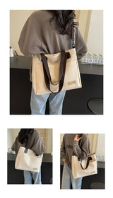 Stylish white canvas tote bag with detachable shoulder strap - Side View
