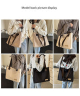 Stylish white canvas tote bag with detachable shoulder strap