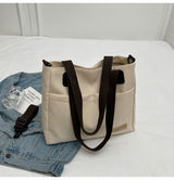 Stylish khaki canvas tote bag with detachable shoulder strap - Side View