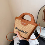 Small and lightweight brown BLONMAY bucket bag, perfect for everyday use