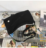 An elegant black shoulder bag for travel and work