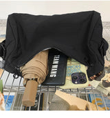 An elegant black shoulder bag for travel and work