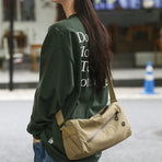 An elegant khaki shoulder bag for travel and work