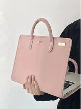 Stylish Leather Laptop Sleeve with Handle and Perforated Design - Soft Pink Color - Top-Down View