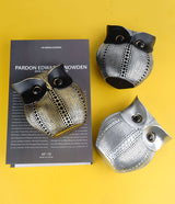 Black resin owl statue - modern perforated design for living room TV cabinet and entryway decoration - Top-Down View