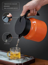 Orange 316 Stainless Steel Stewing Tea Kettle with Wooden Handle - Insulated Tea and Coffee Kettle with Infuser for Home and Office - Side View