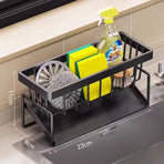 Black metal kitchen sink caddy with towel bar and drain tray