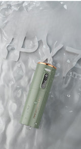 Portable Electric Water Flosser - USB-C Rechargeable, Multiple Modes, Gingival Protection(green) - Top-Down View