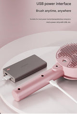 Pink Rechargeable Pet Grooming Brush with UVC Sterilizer & Mist Spray - Close-Up Angle