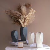 White Abstract Twisted Ceramic Vase - Artistic Minimalist Flower Holder for Home Decor (20x10x10cm) - Top-Down View