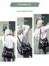 Stylish black tote backpack with heart embellishment - can be worn on one shoulder or as a backpack - Close-Up Angle