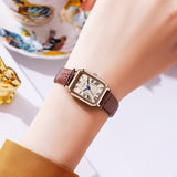 Rose gold case, white dial and black belt Ladies Quartz Watch - Classic Rectangular, Leather Band