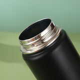 Black Portable Travel Thermos Bottle - Leakproof Stainless Steel Flask with Carry Handle (18oz - 540ml) - Front View