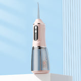 Portable Electric Oral Irrigator with 4 Nozzles 3 Pressure Modes - Pink