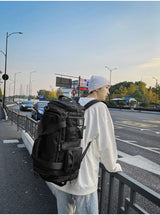 Black Unisex Travel Bag with Utility Buckles and Wet/Dry Compartments - Side View