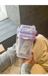 Purple Portable salad cup with ingredient compartment and fork and spoon - enjoy breakfast on the go - Front View