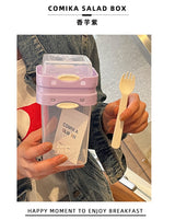 Purple Portable salad cup with ingredient compartment and fork and spoon - enjoy breakfast on the go - Top-Down View